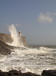 SX10176 Big wave onto lighthouse on harbour wall at Porthcawl point.jpg